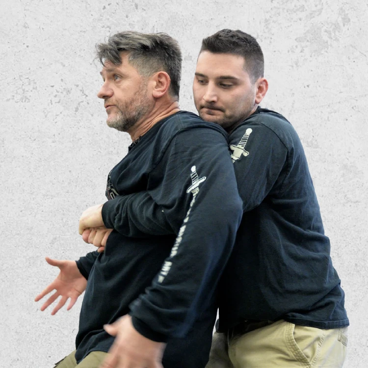 SystemaHQ Head Instructor Vladimir Vasiliev training student how to escape holds