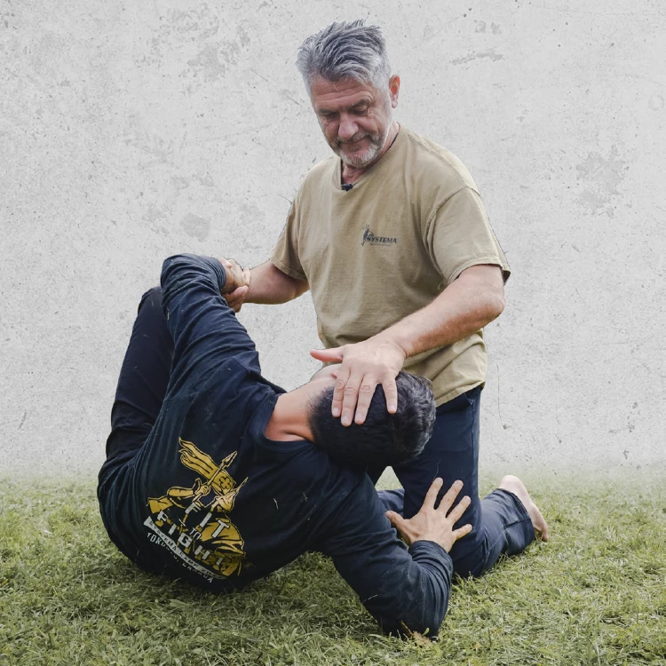 SystemaHQ Head Instructor Vladimir Vasiliev training student Ground Fighting